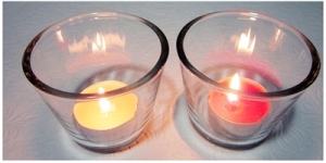 Burn scented candles to make home smell good.